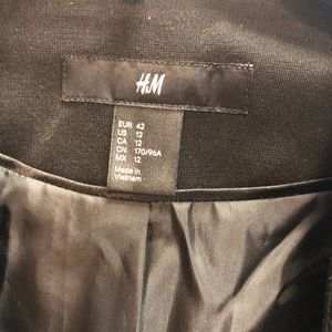 Black Blazer with leather trim.